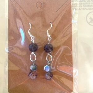 Coffee veined glass bead with brown lava bead and silver findings. 8$